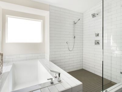 Contemporary Shower with Vertical Tile Pattern